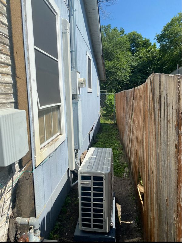Ductless mini-split outdoor unit installed by Paradice Air Conditioning - clean professional installation